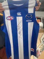 NORTH MELBOURNE Jumper signed by Wayne Carey